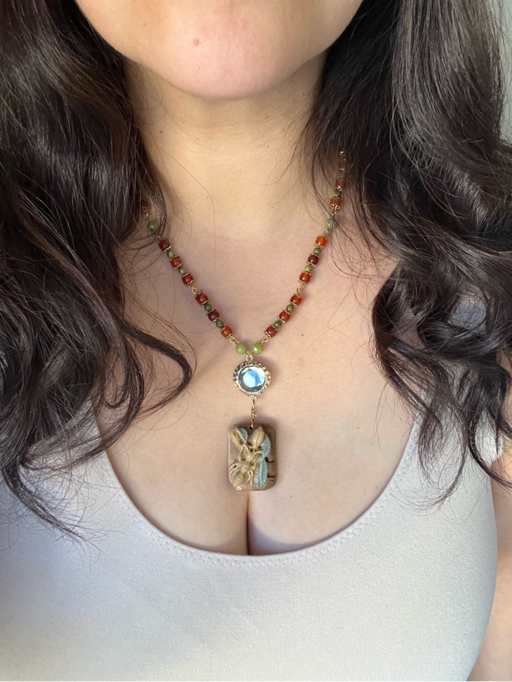 Artisan Green and Brown Beaded Necklace with Ant Carved Pendant